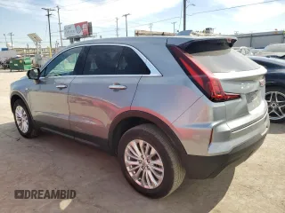 2024 Cadillac XT4 AWD Luxury with VIN 1GYFZBR40RF150020, listed as a Copart auction lot 46184565 with 9,188 mi miles and Salvage Title. Bid and sale history available at carsss.com. Image 2.