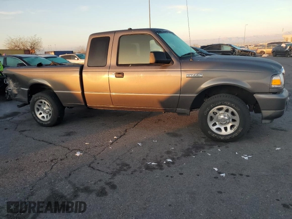 2010 Ford Ranger XLT with VIN 1FTKR4EE2APA08460, listed as a Copart auction lot 48775795 with 575,330 mi miles and Salvage title. Bid and sale history available at DreamBid. Image 4.
