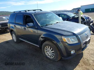 2010 Mercury Mariner Premier z VIN 4M2CN9HG6AKJ17408, wystawiony jako IAAI lot #42374385 z przebiegiem 190 488 mil mil oraz . Historia ofert i sprzedaży dostępna na DreamBid. Obrazek 1.