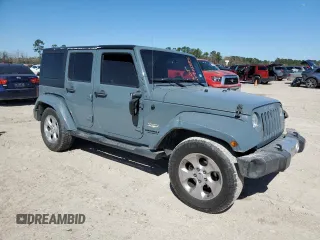 2015 Jeep Wrangler Unlimited Sahara with VIN 1C4BJWEGXFL624846, listed as a Copart auction lot 47949535 with 125,710 mi miles and Salvage Title. Bid and sale history available at carsss.com. Image 4.