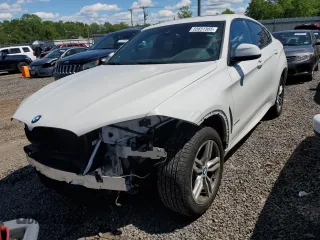 2019 BMW X6 xDrive35i z VIN 5UXKU2C57K0Z64306, wystawiony jako Copart lot #55651585 z przebiegiem 81 838 mil mil oraz Szkoda całkowita • Salvage title. Historia ofert i sprzedaży dostępna na DreamBid. Obrazek 1.