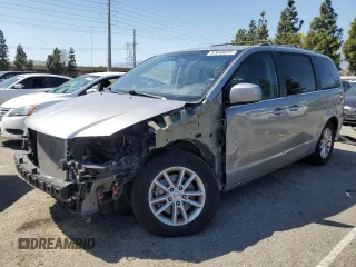 2018 Dodge Grand Caravan SXT z VIN 2C4RDGCG5JR159729, wystawiony jako Copart lot #52648025 z przebiegiem 141 960 mil mil oraz Szkoda całkowita • Salvage title. Historia ofert i sprzedaży dostępna na DreamBid. Obrazek 1.