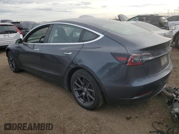 2018 Tesla Model 3 Long Range Battery z VIN 5YJ3E1EB3JF103804, wystawiony jako Copart lot #83752134 z przebiegiem 128 507 mil mil oraz Szkoda całkowita • Salvage title. Historia ofert i sprzedaży dostępna na DreamBid. Obrazek 2.