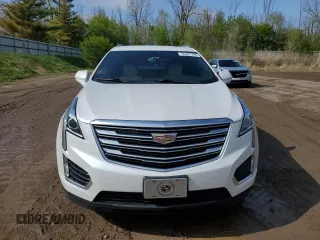 2017 Cadillac XT5 FWD with VIN 1GYKNARS0HZ157551, listed as a Copart auction lot 55281725 with 144,077 mi miles and Clean title. Bid and sale history available at DreamBid. Image 5.