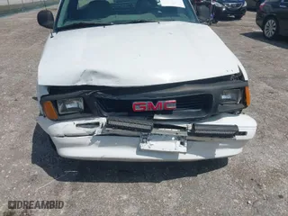 1997 GMC Sonoma with VIN 1GTCS1441VK518317, listed as a IAAI auction lot 41942735 with 75,862 mi miles. Bid and sale history available at carsss.com. Image 6.