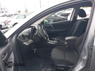 2013 Mazda 3 i Touring z VIN JM1BL1VP9D1776008, wystawiony jako IAAI lot #42185317 z przebiegiem 174 085 mil mil oraz . Historia ofert i sprzedaży dostępna na DreamBid. Obrazek 5.