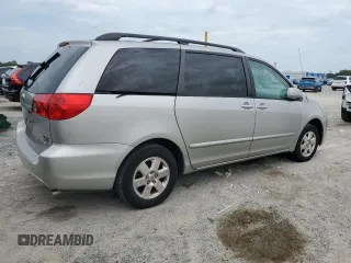 2012 Toyota Sienna XLE AAS with VIN 5TDYK3DC6CS275537, listed as a Copart auction lot 66040605 with 135,148 mi miles and Clean title. Bid and sale history available at DreamBid. Image 3.