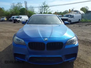 2013 BMW M5 with VIN WBSFV9C56DC774032, listed as a IAAI auction lot 42124754 with 55,409 mi miles. Bid and sale history available at carsss.com. Image 12.