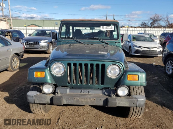 2001 Jeep Wrangler Sahara with VIN 1J4FA59S31P324555, listed as a Copart auction lot 80100734 with 136,973 mi miles and Clean Title. Bid and sale history available at carsss.com. Image 5.