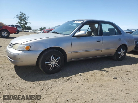 1998 Toyota Corolla VE with VIN 1NXBR18E6WZ080700, listed as a Copart auction lot 58605135 with 214,928 mi miles and Salvage title. Bid and sale history available at DreamBid. Image 1.