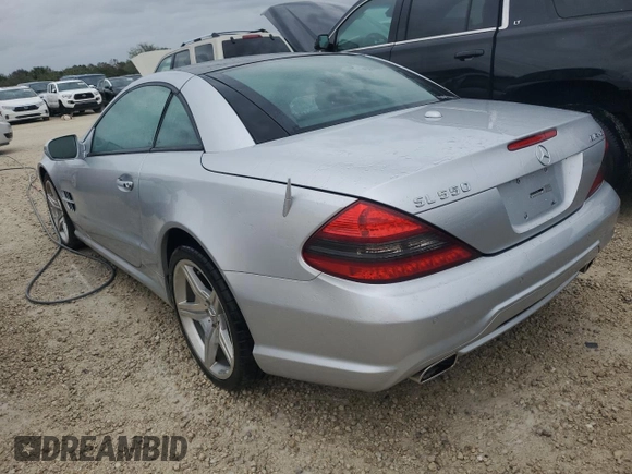 2009 Mercedes-Benz SL 550 с VIN WDBSK71F49F147896, выставлен на аукционе Copart как лот 76528604 с пробегом Не указан миль и Списание • Salvage title. История ставок и продаж доступна на DreamBid. Изображение 2.
