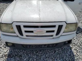 2006 Ford Ranger STX z VIN 1FTYR44U76PA03152, wystawiony jako Copart lot #57479265 z przebiegiem Nie podano mil oraz Czysty tytuł • Clean title. Historia ofert i sprzedaży dostępna na DreamBid. Obrazek 11.