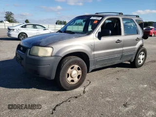 2004 Ford Escape XLS with VIN 1FMYU92134KA21707, listed as a Copart auction lot 72114804 with 219,518 mi miles and Salvage Title. Bid and sale history available at DreamBid. Image 1.