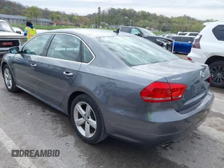 2013 Volkswagen Passat SE with VIN 1VWBH7A31DC084351, listed as a IAAI auction lot 42014167 with 187,959 mi miles and . Bid and sale history available at DreamBid. Image 3.