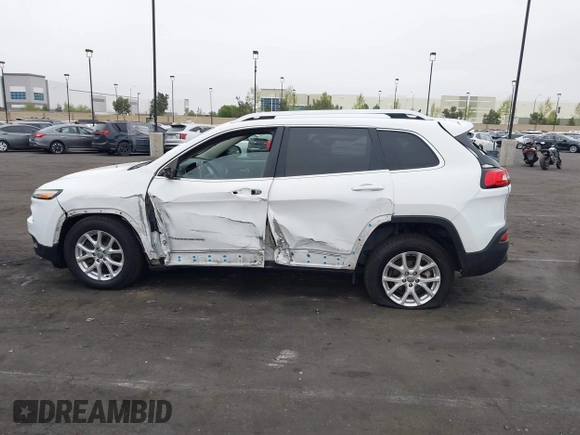 2015 Jeep Cherokee Latitude with VIN 1C4PJLCB0FW761871, listed as a IAAI auction lot 42099336 with 213,049 mi miles and . Bid and sale history available at DreamBid. Image 15.