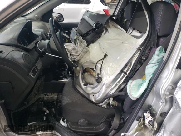 2011 Chevrolet Aveo 1LT z VIN KL1TD5DE6BB154327, wystawiony jako Copart lot #51313085 z przebiegiem 76 402 mil mil oraz Szkoda całkowita • Salvage title. Historia ofert i sprzedaży dostępna na DreamBid. Obrazek 7.