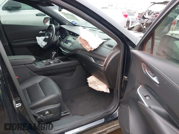 2019 Cadillac XT4 FWD Sport with VIN 1GYFZER47KF229708, listed as a IAAI auction lot 42071405 with 108,767 mi miles and . Bid and sale history available at DreamBid. Image 5.