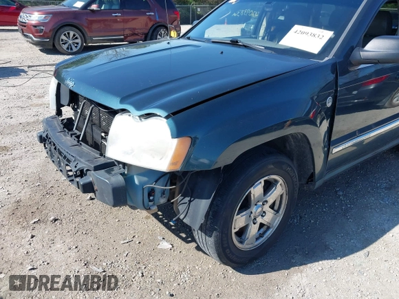 2006 Jeep Grand Cherokee Limited with VIN 1J4HR58NX6C114451, listed as a IAAI auction lot 42093832 with 264,418 mi miles. Bid and sale history available at carsss.com. Image 18.
