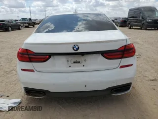 2018 BMW 7 Series 740i with VIN WBA7E2C51JG742075, listed as a Copart auction lot 65057923 with 0 mi miles. Bid and sale history available at carsss.com. Image 6.
