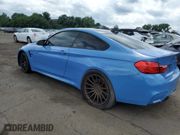 2015 BMW M4 with VIN WBS3R9C57FK332148, listed as a Copart auction lot 64934594 with 72,669 mi miles and Salvage Title. Bid and sale history available at carsss.com. Image 2.