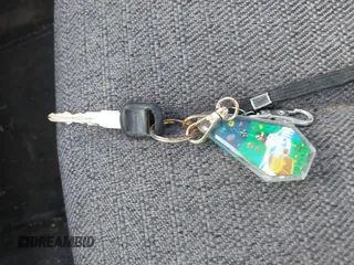 1999 Pontiac Sunfire SE z VIN 1G2JB5247X7575780, wystawiony jako IAAI lot #42143427 z przebiegiem Nie podano mil oraz . Historia ofert i sprzedaży dostępna na DreamBid. Obrazek 11.
