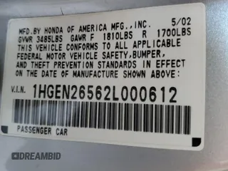 2002 Honda Civic z VIN 1HGEN26562L000612, wystawiony jako Copart lot #77596944 z przebiegiem 95 426 mil mil oraz Szkoda całkowita • Salvage title. Historia ofert i sprzedaży dostępna na DreamBid. Obrazek 14.