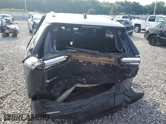 2019 Toyota RAV4 LE with VIN JTMH1RFV8KD039728, listed as a Copart auction lot 59669035 with 100,355 mi miles and Salvage title. Bid and sale history available at DreamBid. Image 6.