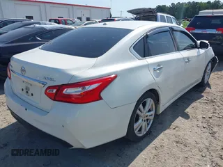 2016 Nissan Altima SL with VIN 1N4BL3AP5GC162718, listed as a IAAI auction lot 42309046 with 164,365 mi miles and . Bid and sale history available at DreamBid. Image 4.