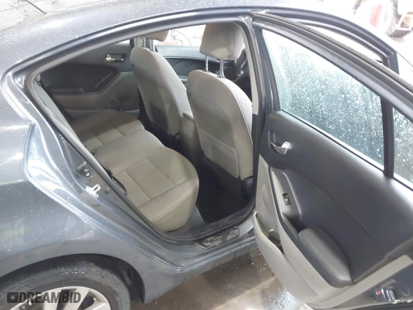 2014 Kia Forte LX with VIN KNAFX4A69E5237321, listed as a IAAI auction lot 41534280 with 100,810 mi miles. Bid and sale history available at carsss.com. Image 8.