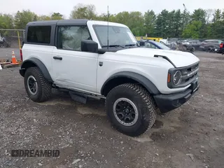 2023 Ford Bronco z VIN 1FMDE5CH6PLC11404, wystawiony jako IAAI lot #42274412 z przebiegiem 5 243 mil mil oraz . Historia ofert i sprzedaży dostępna na DreamBid. Obrazek 1.