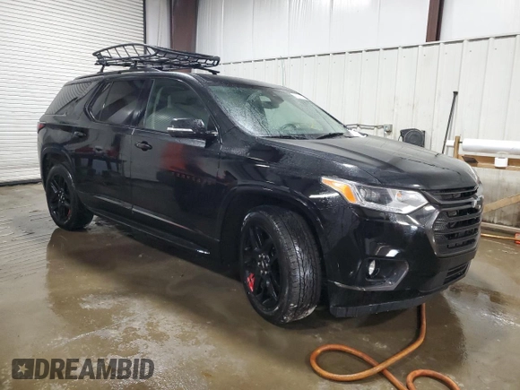2020 Chevrolet Traverse Premier with VIN 1GNEVKKW3LJ310766, listed as a Copart auction lot 42061655 with 103,813 mi miles and Salvage Title. Bid and sale history available at carsss.com. Image 4.