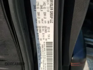 2015 Dodge Durango R/T z VIN 1C4SDJCT4FC710129, wystawiony jako Copart lot #59618075 z przebiegiem 159 577 mil mil oraz Szkoda całkowita • Salvage title. Historia ofert i sprzedaży dostępna na DreamBid. Obrazek 13.