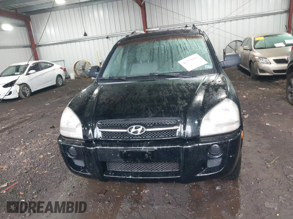 2005 Hyundai Tucson GL with VIN KM8JM12B75U072080, listed as a IAAI auction lot 41779464 with 191,771 mi miles. Bid and sale history available at carsss.com. Image 12.