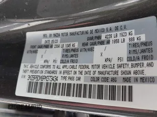 2023 Mazda 3 S Premium with VIN 3MZBPBDM8PM373434, listed as a IAAI auction lot 41234729 with 9,387 mi miles and . Bid and sale history available at DreamBid. Image 9.