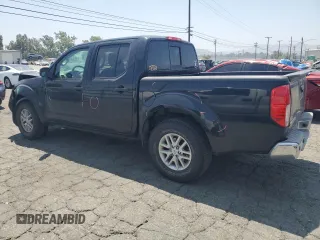 2015 Nissan Frontier SV with VIN 1N6AD0ER4FN767942, listed as a Copart auction lot 60911325 with 118,611 mi miles and Salvage title. Bid and sale history available at DreamBid. Image 2.