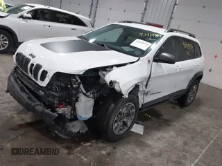 2021 Jeep Cherokee Trailhawk with VIN 1C4PJMBX8MD139644, listed as a IAAI auction lot 42419334 with 68,333 mi miles and . Bid and sale history available at DreamBid. Image 2.