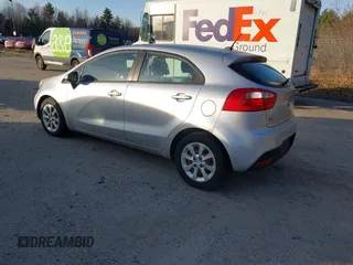 2013 Kia Rio LX with VIN KNADM5A32D6168492, listed as a IAAI auction lot 42144898 with 127,228 mi miles. Bid and sale history available at carsss.com. Image 3.