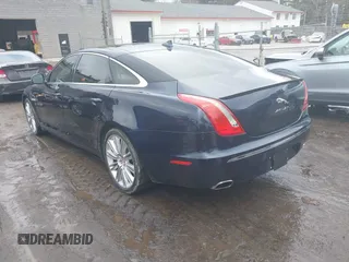 2015 Jaguar XJ Portfolio with VIN SAJWJ2GD0F8V83497, listed as a IAAI auction lot 41697285 with 52,311 mi miles and . Bid and sale history available at DreamBid. Image 3.