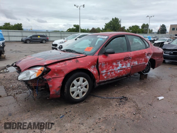 2001 Ford Taurus LX with VIN 1FAFP52UX1A176008, listed as a Copart auction lot 58983935 with 123,985 mi miles and Salvage title. Bid and sale history available at DreamBid. Image 1.
