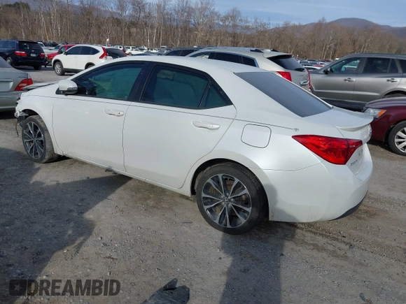 2017 Toyota Corolla L z VIN 5YFBURHE5HP633791, wystawiony jako IAAI lot #41426630 z przebiegiem 99 450 mil mil oraz . Historia ofert i sprzedaży dostępna na DreamBid. Obrazek 3.