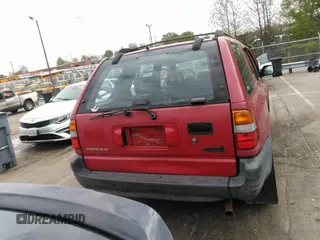 1998 Isuzu Rodeo S z VIN 4S2CK58WXW4325645, wystawiony jako IAAI lot #42013228 z przebiegiem 300 698 mil mil oraz . Historia ofert i sprzedaży dostępna na DreamBid. Obrazek 16.