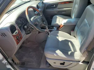 2006 GMC Envoy Denali with VIN 1GKET63M762190296, listed as a Copart auction lot 46691595 with 128,985 mi miles and Salvage Title. Bid and sale history available at carsss.com. Image 7.