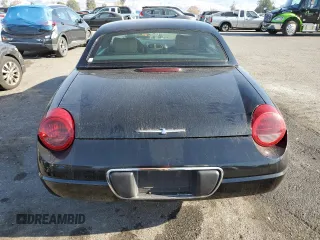 2004 Ford Thunderbird Deluxe with VIN 1FAHP60AX4Y104244, listed as a Copart auction lot 84561114 with 79,379 mi miles and Clean Title. Bid and sale history available at DreamBid. Image 6.