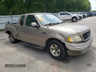 2003 Ford F-150 XL with VIN 1FTRX07213KD96765, listed as a Copart auction lot 53745465 with 292,863 mi miles and Salvage title. Bid and sale history available at DreamBid. Image 4.