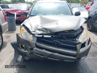 2009 Toyota RAV4 with VIN JTMZF33V69D015171, listed as a IAAI auction lot 42006163 with 122,927 mi miles. Bid and sale history available at carsss.com. Image 6.