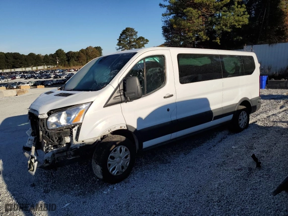 2018 Ford Transit Passenger Wagon XL with VIN 1FBZX2ZM7JKA10345, listed as a Copart auction lot 82821474 with 70,036 mi miles and Clean Title. Bid and sale history available at carsss.com. Image 1.