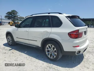 2012 BMW X5 35i z VIN 5UXZV4C54CL990840, wystawiony jako Copart lot #57715245 z przebiegiem 166 192 mil mil oraz Szkoda całkowita • Salvage title. Historia ofert i sprzedaży dostępna na DreamBid. Obrazek 2.