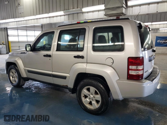 2010 Jeep Liberty Sport with VIN 1J4PN2GK6AW101135, listed as a Copart auction lot 58216735 with 202,901 mi miles and Clean title. Bid and sale history available at DreamBid. Image 2.
