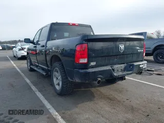 2014 Ram 1500 Express with VIN 1C6RR7KTXES331605, listed as a IAAI auction lot 41618433 with 137,906 mi miles. Bid and sale history available at carsss.com. Image 3.
