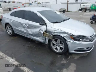 2014 Volkswagen CC R-Line z VIN WVWBP7AN4EE536144, wystawiony jako IAAI lot #42370642 z przebiegiem 144 637 mil mil oraz . Historia ofert i sprzedaży dostępna na DreamBid. Obrazek 1.
